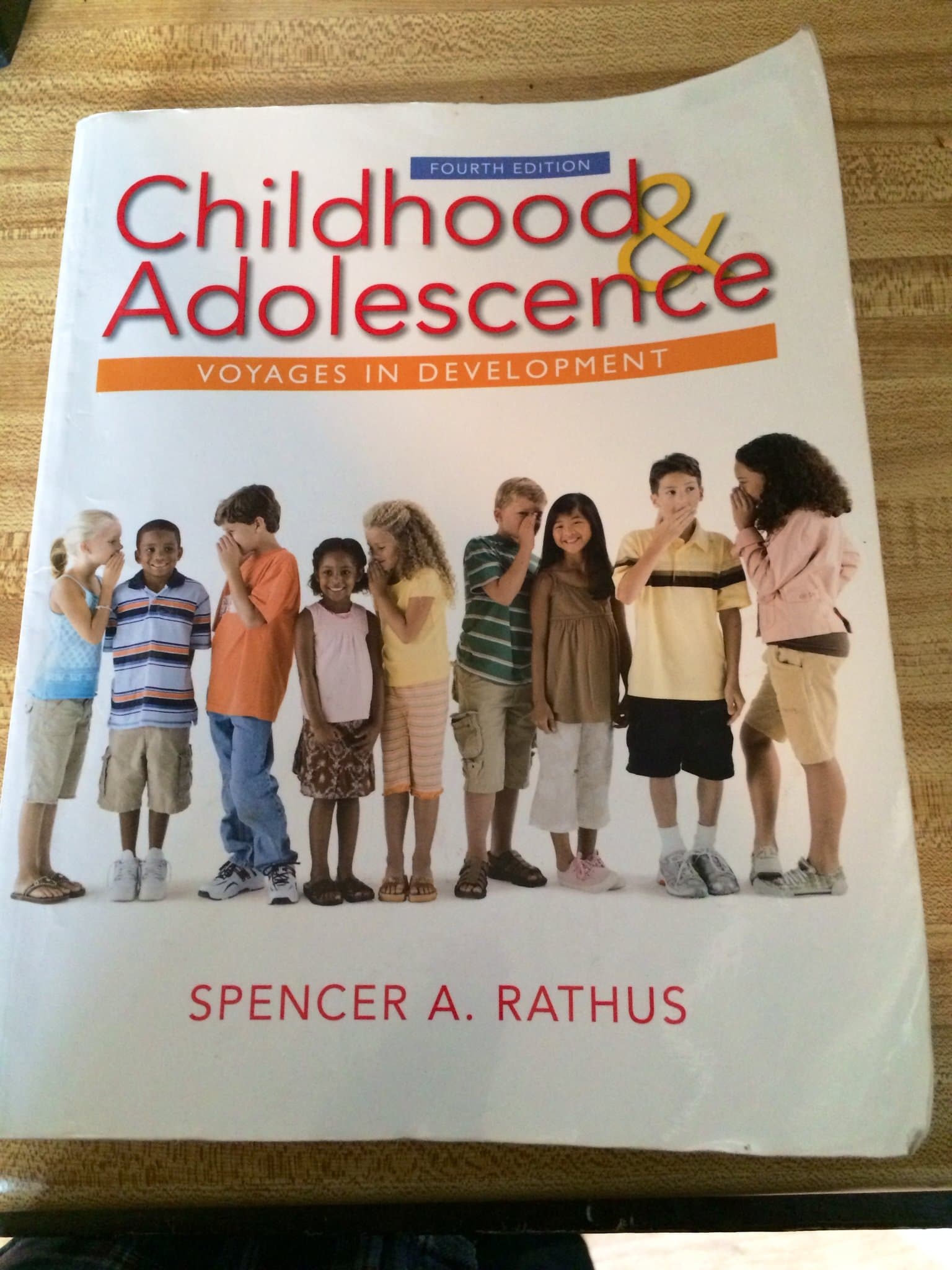 Childhood and Adolescence: Voyages in Development 4 (Paperback) by Rathus, Spencer A. textbook cover