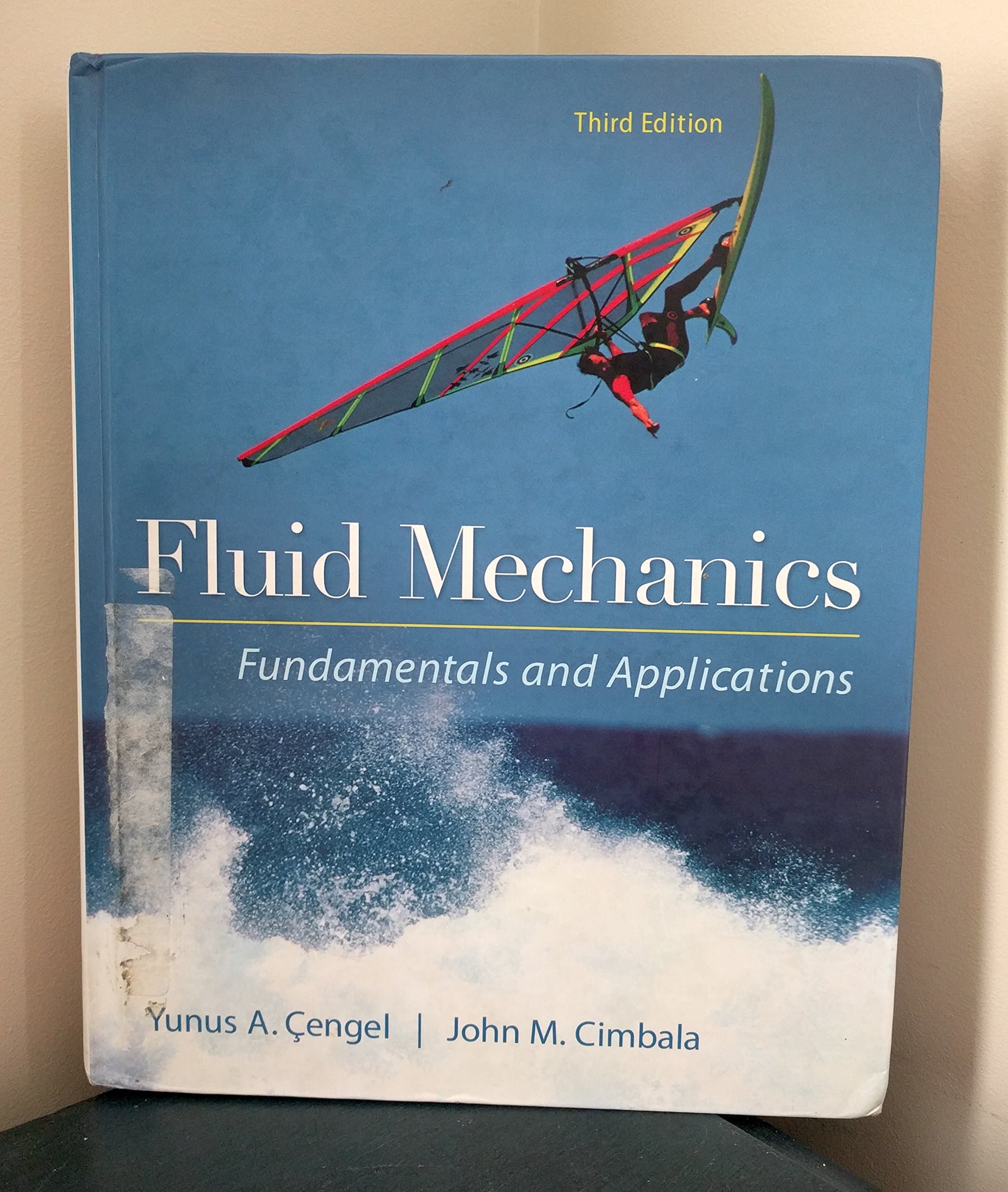 Fluid Mechanics Fundamentals and Applications 3rd Edition (Hardcover) by Cengel, Yunus textbook cover